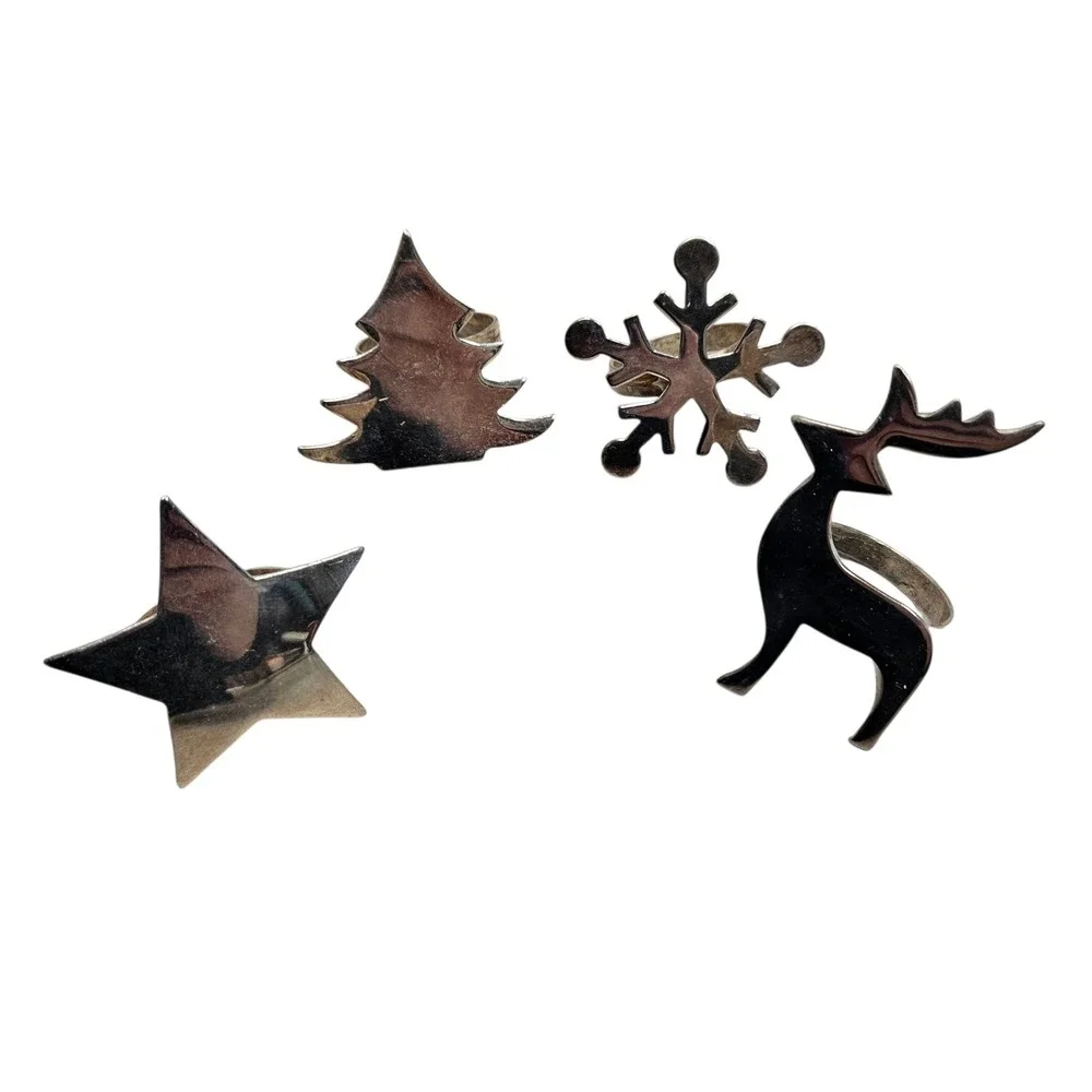 Silver Holiday Napkin Rings Set 4 Christmas Star Tree Snowflake Reindeer Festive